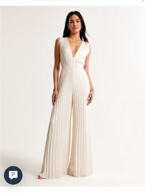 Abercrombie & Fitch Plissé Deep-V Wide-Leg Jumpsuit in Ivory